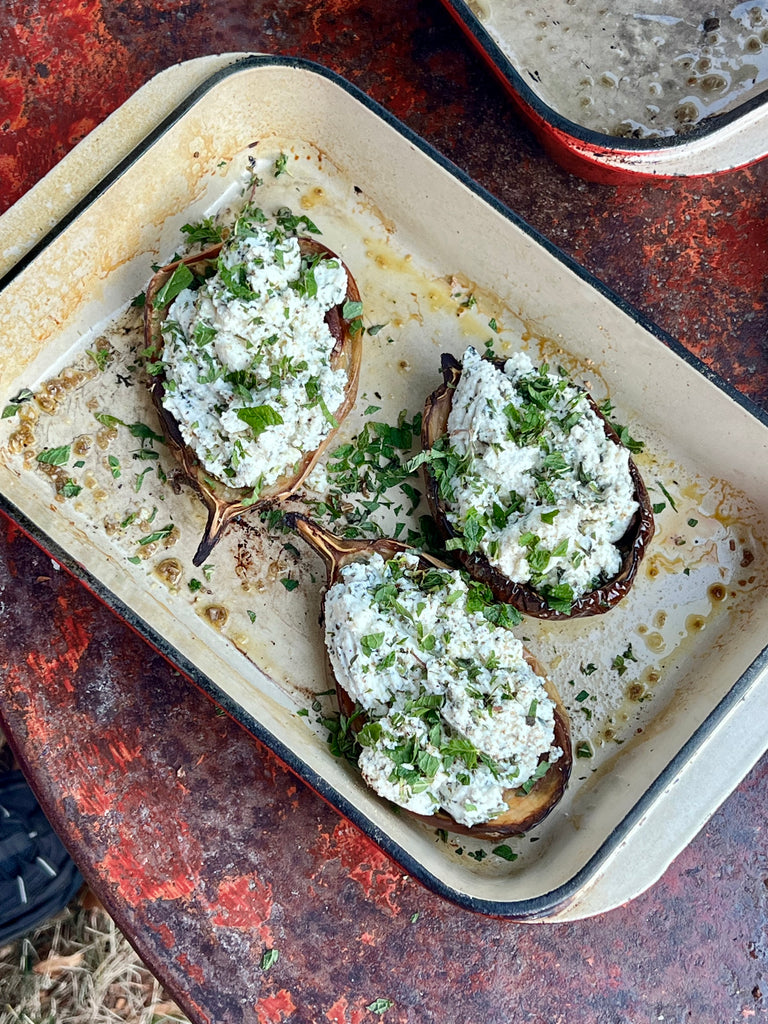 Aubergines stuffed with ricotta and herbs