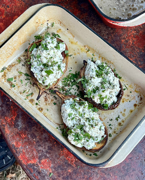 Aubergines stuffed with ricotta and herbs
