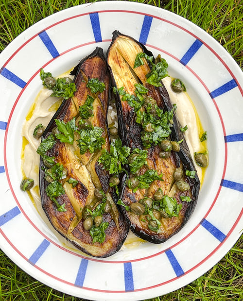 Roasted aubergine with tahini sauce, and parsley and capers salsa